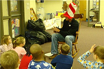 Trey Cochran-Gill (11th grader from THS) reading to Mrs. Branch's 2nd grade class.  Submitted by Laura Lott
